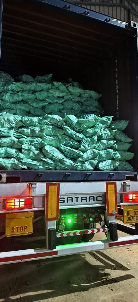 Container filled with export sacks